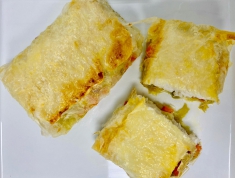 LOMOS DE MERLUZA CON VERDURITAS EN MASA FILO